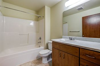 Bathroom with sink, toilet and tub